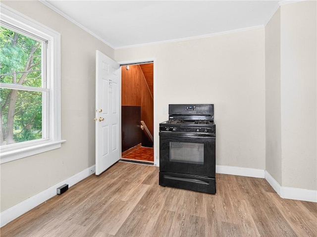 896-898 S Plymouth Ave, Rochester, NY 14608 - kitchen featuring black range with gas cooktop, light wood-type flooring, healthy amount of natural light, and ornamental molding