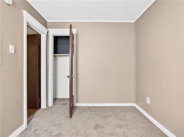 896-898 S Plymouth Ave, Rochester, NY 14608 - unfurnished bedroom with carpet, crown molding, and a closet