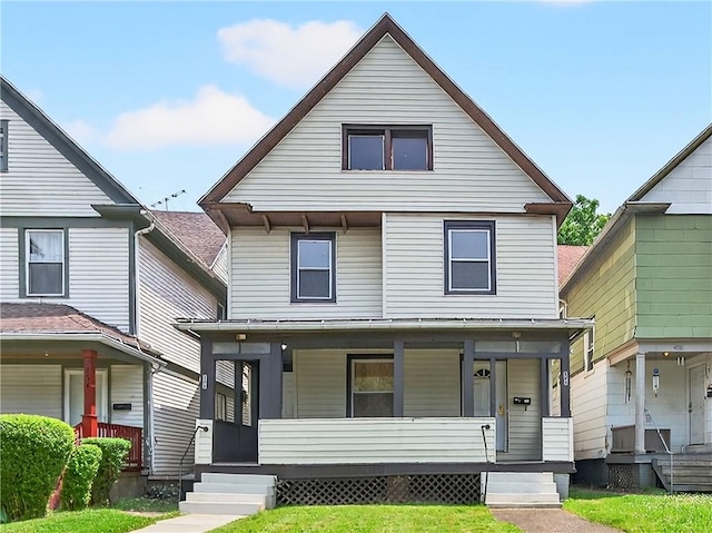 896-898 S Plymouth Ave, Rochester, NY 14608 - view of front of house featuring covered porch and a front lawn