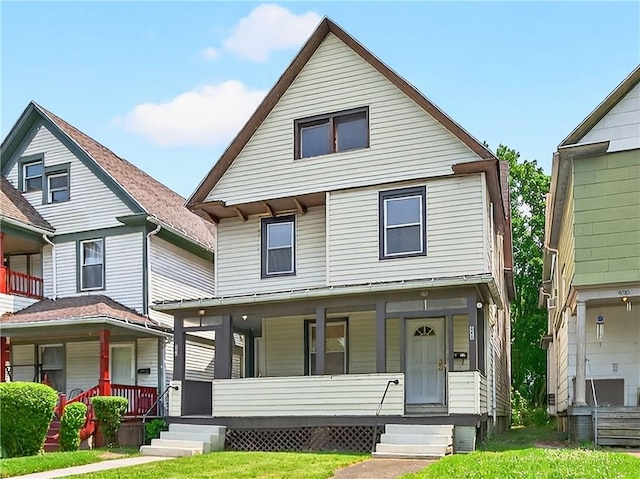 896-898 S Plymouth Ave, Rochester, NY 14608 - view of front facade featuring a porch and a front yard