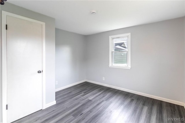 370 W W Girard Blvd, Tonawanda, NY 14217 - spare room featuring dark wood finished floors and a smoke detector