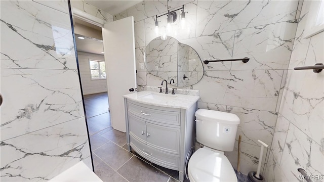 370 W W Girard Blvd, Tonawanda, NY 14217 - bathroom with vanity and tile walls