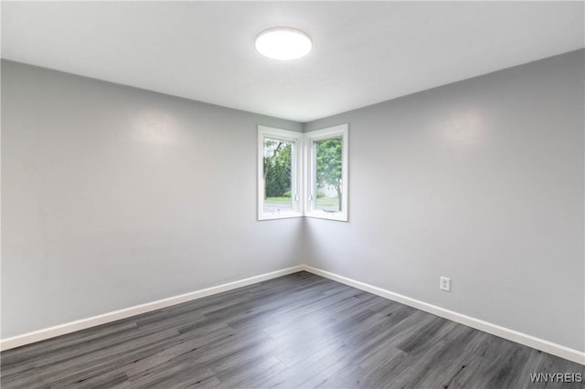 370 W W Girard Blvd, Tonawanda, NY 14217 - unfurnished room with dark wood finished floors and baseboards