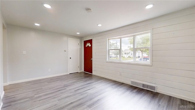 370 W W Girard Blvd, Tonawanda, NY 14217 - foyer with recessed lighting, wood finished floors, and wooden walls