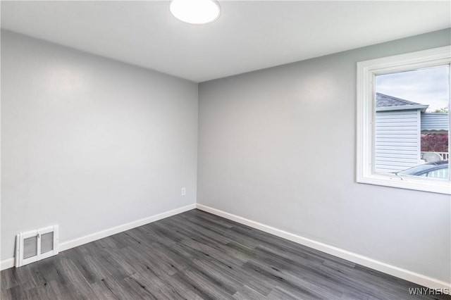 370 W W Girard Blvd, Tonawanda, NY 14217 - unfurnished room featuring baseboards and dark wood-type flooring