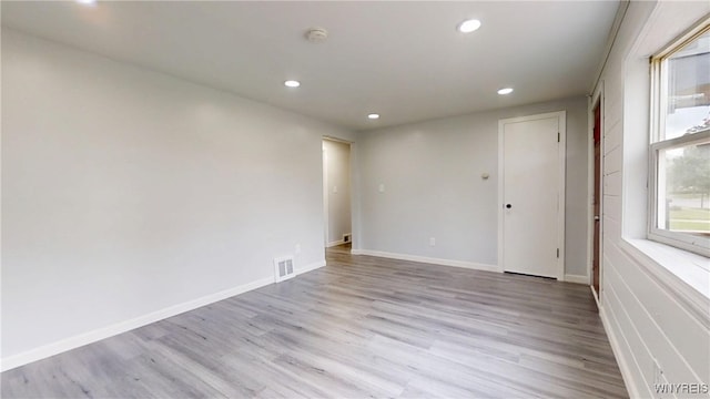 370 W W Girard Blvd, Tonawanda, NY 14217 - unfurnished room featuring recessed lighting, light wood-style floors, and a smoke detector