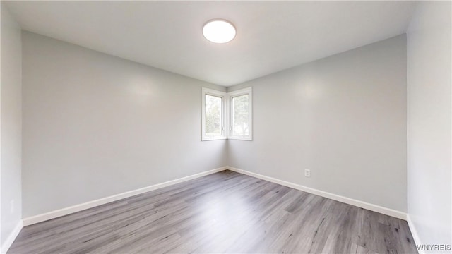 370 W W Girard Blvd, Tonawanda, NY 14217 - spare room with wood finished floors and baseboards