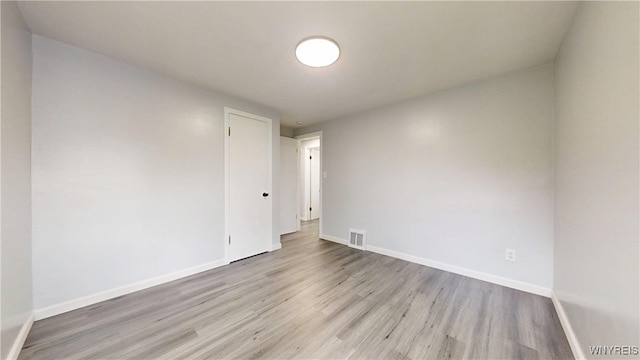 370 W W Girard Blvd, Tonawanda, NY 14217 - empty room with wood finished floors and baseboards