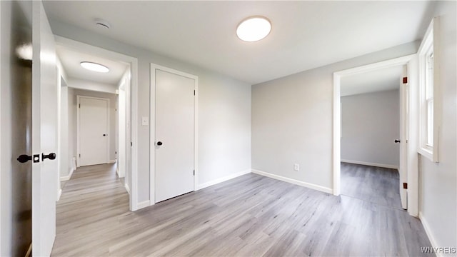 370 W W Girard Blvd, Tonawanda, NY 14217 - spare room with light wood-style flooring and a smoke detector