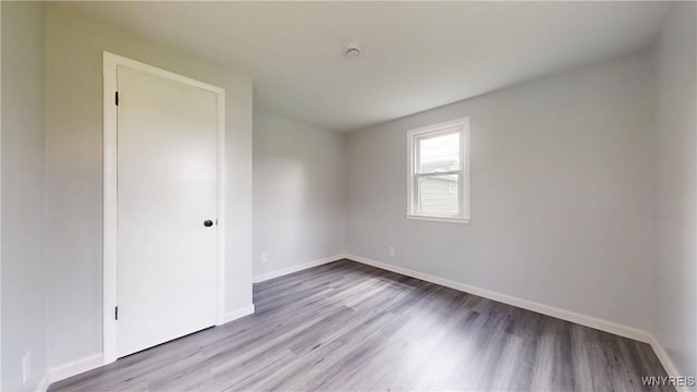370 W W Girard Blvd, Tonawanda, NY 14217 - unfurnished room featuring wood finished floors and a smoke detector