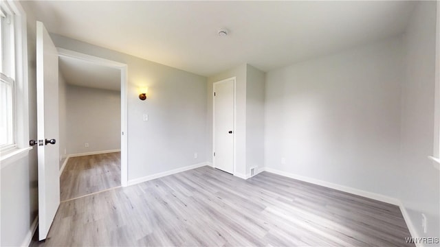 370 W W Girard Blvd, Tonawanda, NY 14217 - empty room with light wood-style floors and baseboards