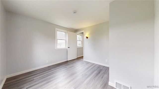 370 W W Girard Blvd, Tonawanda, NY 14217 - unfurnished room with wood finished floors and a smoke detector