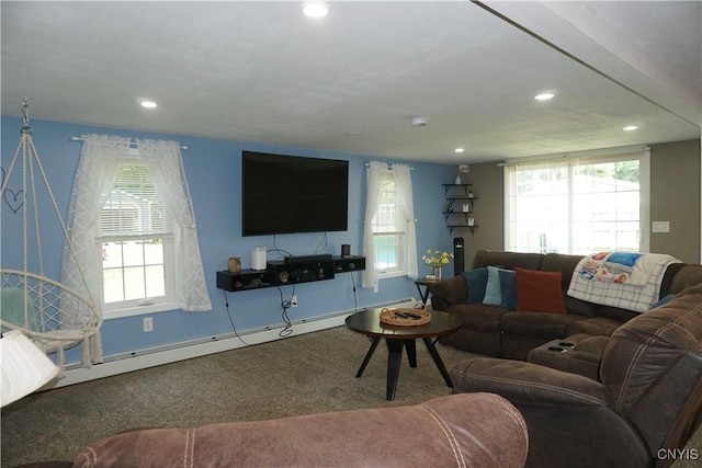 7545 River Rd, Lysander, NY 13027 - carpeted living area with recessed lighting and a baseboard heating unit