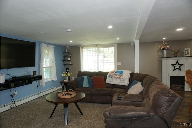 7545 River Rd, Lysander, NY 13027 - living area featuring recessed lighting, a fireplace, and a baseboard radiator