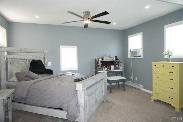 7545 River Rd, Lysander, NY 13027 - bedroom with light carpet, recessed lighting, a baseboard heating unit, and ceiling fan