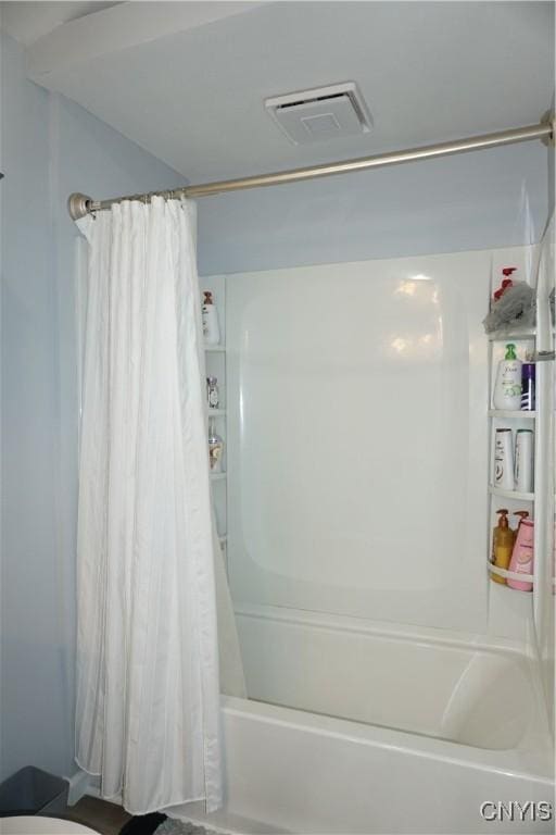 7545 River Rd, Lysander, NY 13027 - bathroom featuring shower / tub combo with curtain