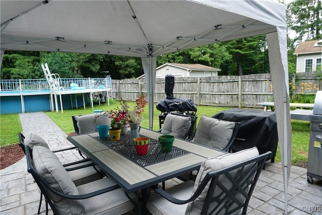 7545 River Rd, Lysander, NY 13027 - view of patio / terrace featuring outdoor dining area and grilling area