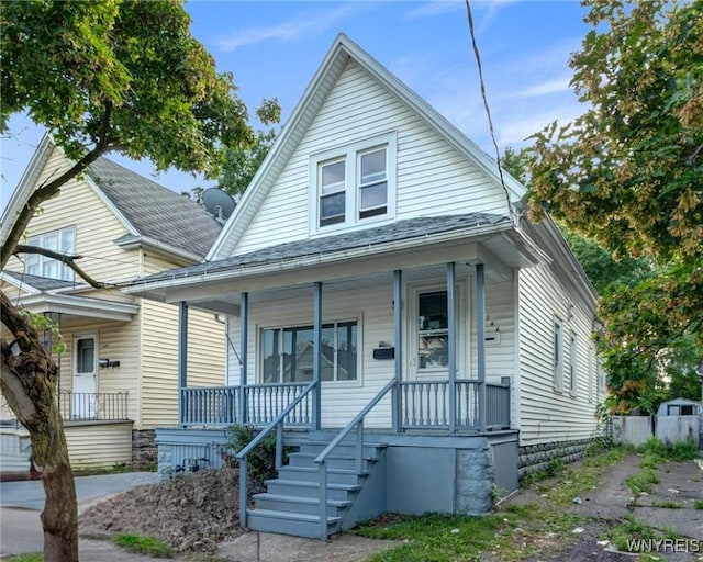 146 Longnecker St, Buffalo, NY 14206 - bungalow-style house featuring covered porch and a shingled roof