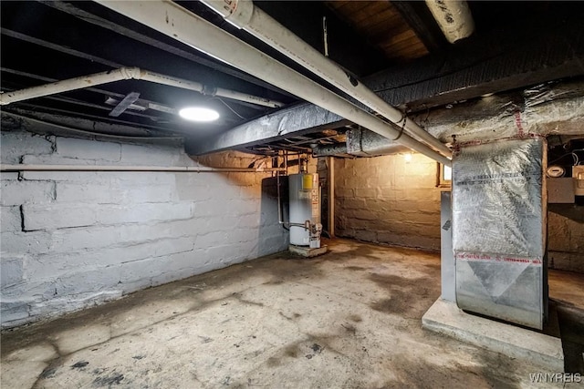 146 Longnecker St, Buffalo, NY 14206 - unfinished basement featuring water heater and heating unit