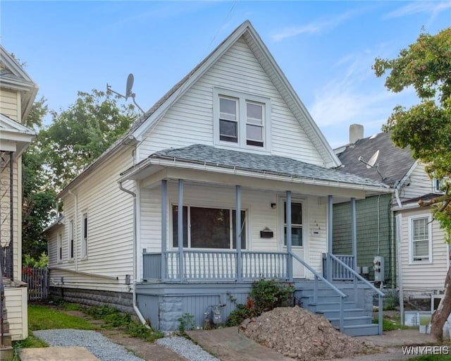 146 Longnecker St, Buffalo, NY 14206 - bungalow with a porch and roof with shingles