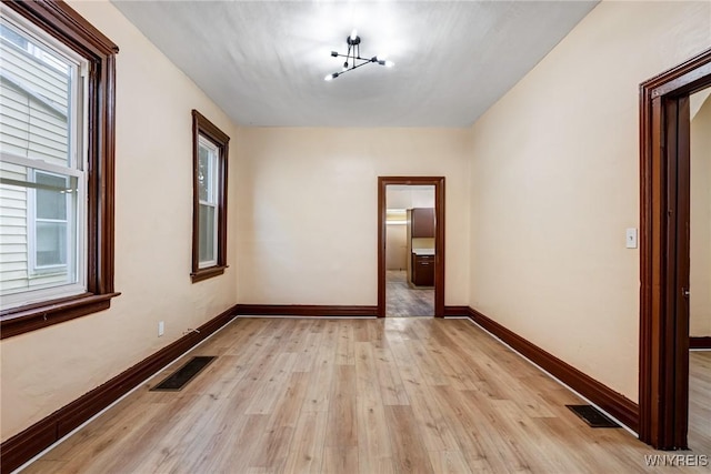 146 Longnecker St, Buffalo, NY 14206 - spare room featuring plenty of natural light and light wood-style flooring