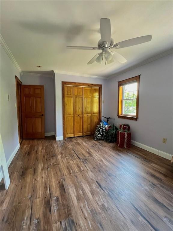 110 Mcmaster St, Bath, NY 14810 - unfurnished bedroom featuring wood finished floors, crown molding, ceiling fan, and a closet