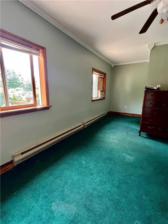 110 Mcmaster St, Bath, NY 14810 - spare room with crown molding, a baseboard radiator, ceiling fan, carpet floors, and cooling unit