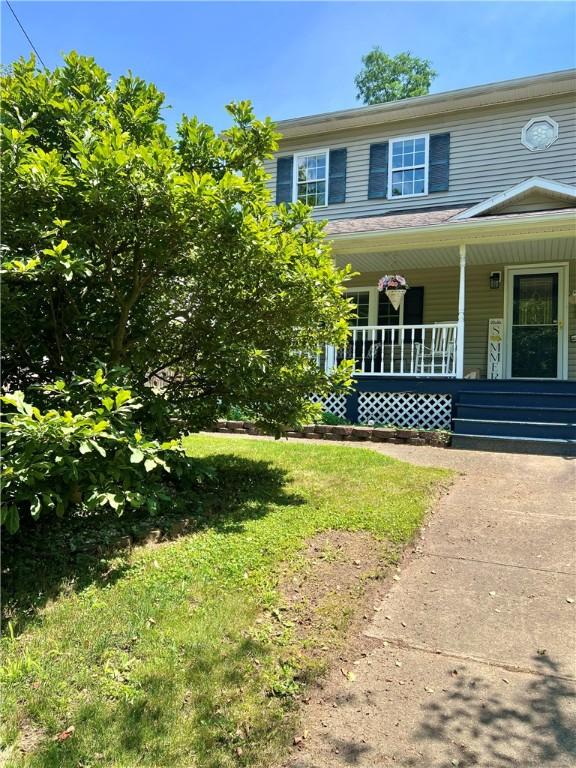 110 Mcmaster St, Bath, NY 14810 - colonial-style house featuring a porch