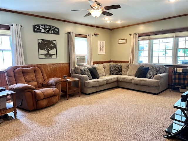 110 Mcmaster St, Bath, NY 14810 - carpeted living room with a wainscoted wall, a ceiling fan, wood walls, ornamental molding, and cooling unit