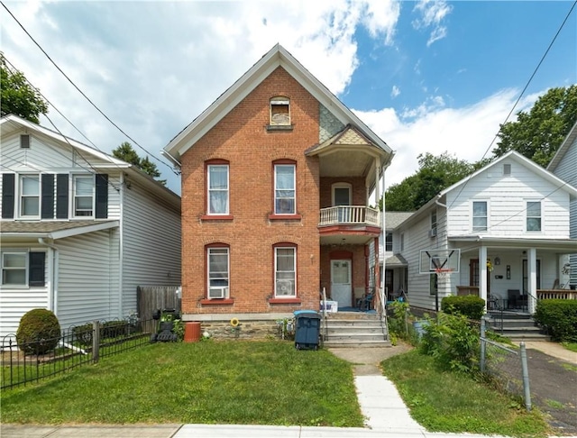 364 W 3rd St, Elmira City, NY 14901 - view of front of property featuring brick siding, covered porch, and a balcony