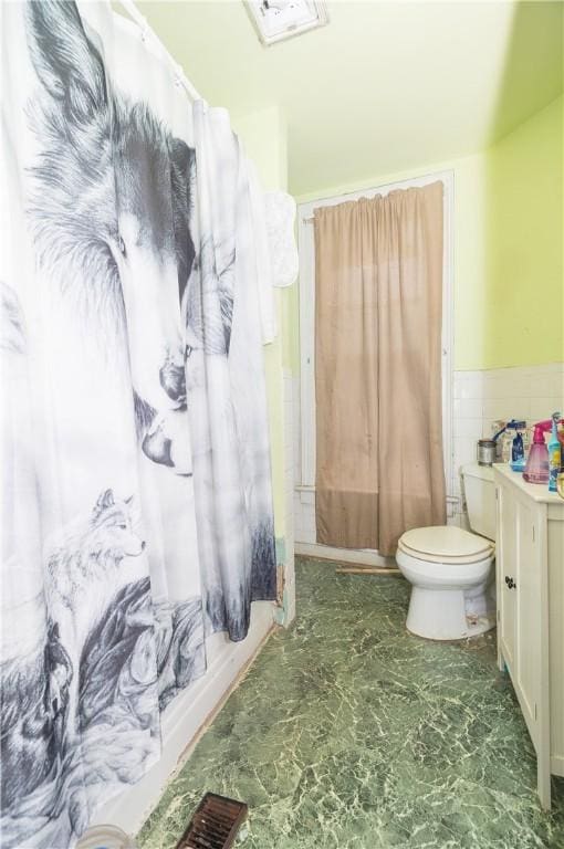 364 W 3rd St, Elmira City, NY 14901 - bathroom featuring vanity, a wainscoted wall, and tile walls