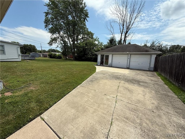 31 Noel Dr, Amherst, NY 14221 - view of yard featuring an outdoor structure and a detached garage