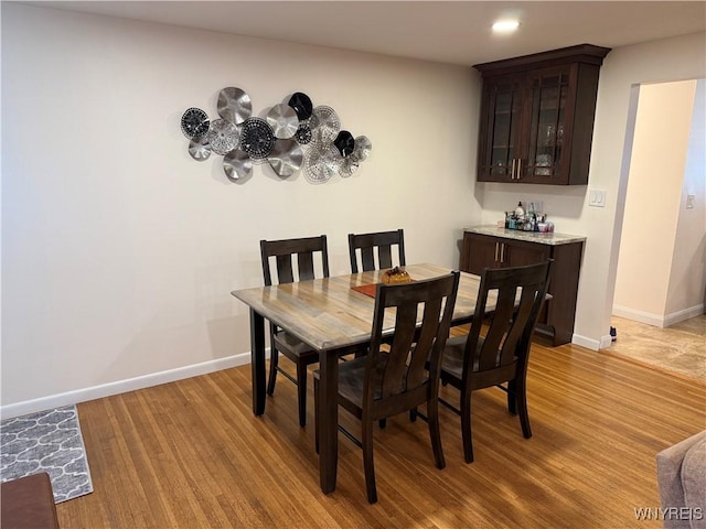 31 Noel Dr, Amherst, NY 14221 - dining area featuring light wood-style flooring, bar, and recessed lighting