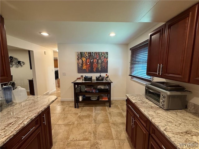 31 Noel Dr, Amherst, NY 14221 - kitchen featuring light stone counters and recessed lighting