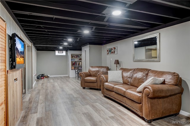 7 Cannas Ct, Cheektowaga, NY 14227 - living area featuring light wood-style flooring and baseboards