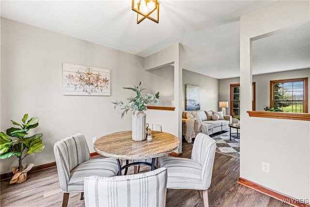 374 Dewey Ave, Buffalo, NY 14214 - dining area with wood finished floors and baseboards