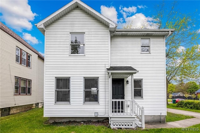 374 Dewey Ave, Buffalo, NY 14214 - back of house with a yard and entry steps