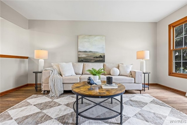 374 Dewey Ave, Buffalo, NY 14214 - living area featuring baseboards and wood finished floors