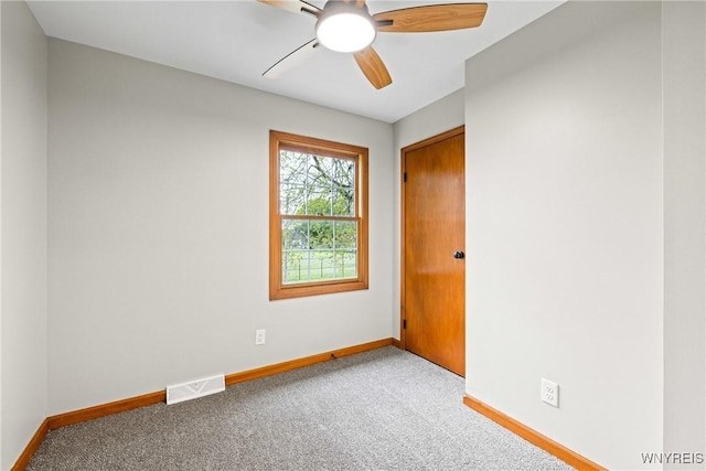 374 Dewey Ave, Buffalo, NY 14214 - carpeted empty room with baseboards and a ceiling fan