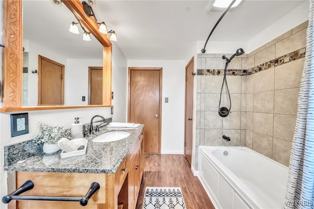 94 N Seine Dr, Cheektowaga, NY 14227 - full bathroom featuring bathtub / shower combination, vanity, and wood finished floors