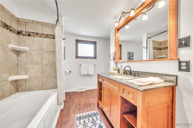 94 N Seine Dr, Cheektowaga, NY 14227 - bathroom with vanity, shower / tub combo, and wood finished floors