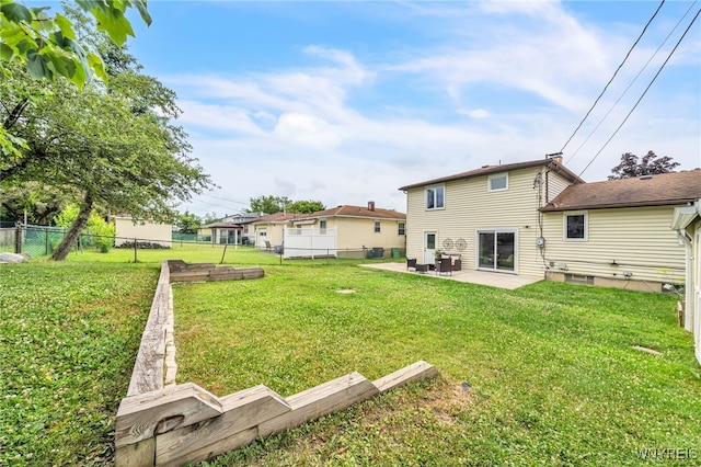 94 N Seine Dr, Cheektowaga, NY 14227 - rear view of house featuring a patio