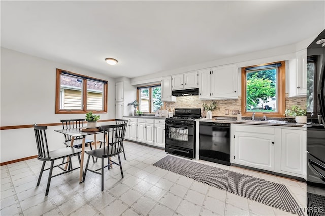 94 N Seine Dr, Cheektowaga, NY 14227 - kitchen featuring black appliances, under cabinet range hood, decorative backsplash, and white cabinets
