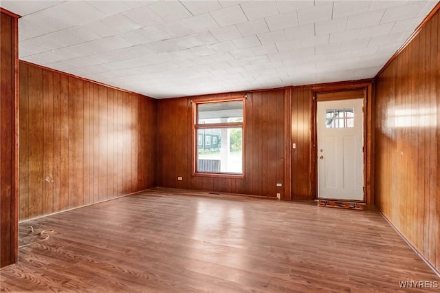 1329 Clinton St, Buffalo, NY 14206 - entrance foyer featuring healthy amount of natural light, wood finished floors, and wooden walls