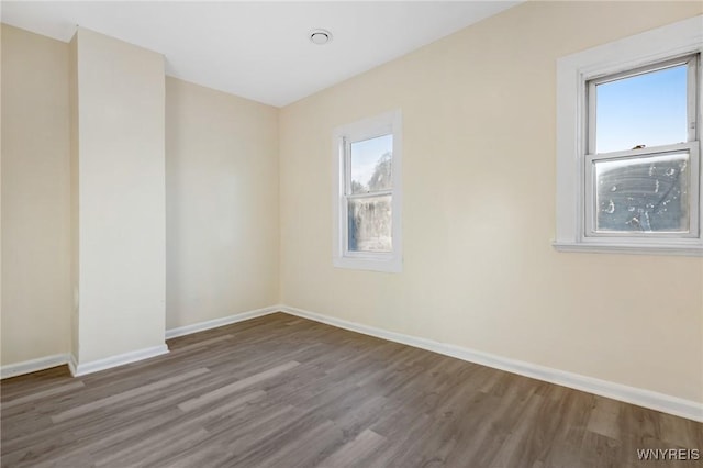 1329 Clinton St, Buffalo, NY 14206 - unfurnished room with wood finished floors and healthy amount of natural light