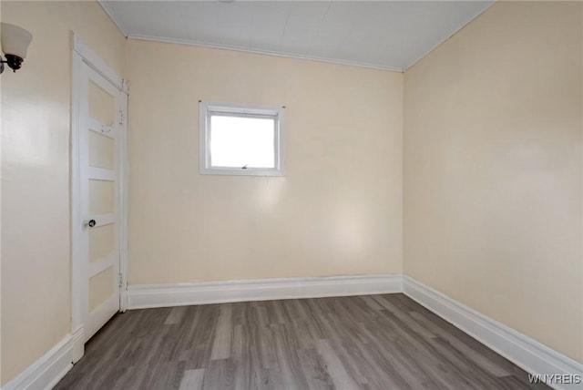 1329 Clinton St, Buffalo, NY 14206 - empty room with crown molding and dark wood-type flooring