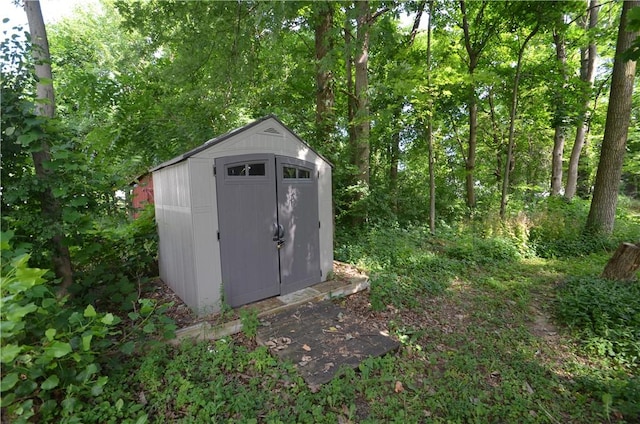 162 Miramar Rd, Gates, NY 14624 - view of shed with a forest view