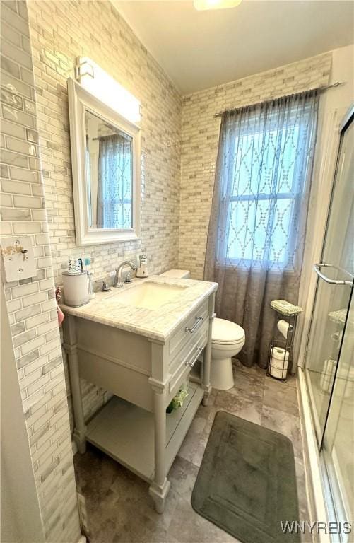 93 Century Dr, West Seneca, NY 14224 - bathroom with a shower with door and vanity