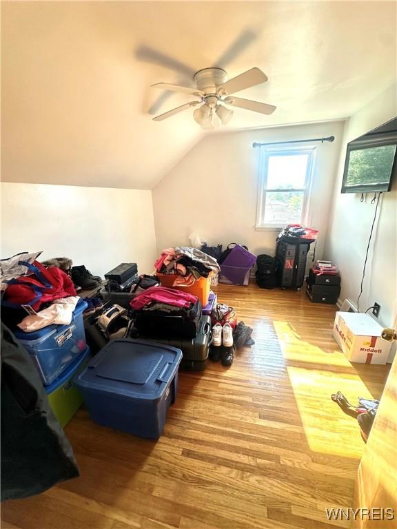 93 Century Dr, West Seneca, NY 14224 - additional living space with wood finished floors, a ceiling fan, and lofted ceiling