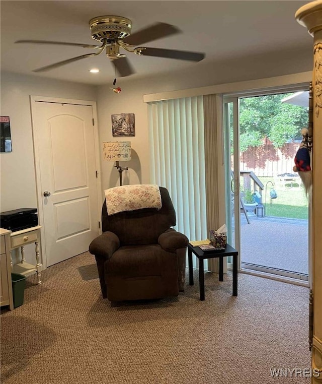 120 Park Lane Cir, Lockport City, NY 14094 - living area with carpet flooring and a ceiling fan